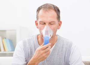 Man suffering from his chronic respiratory disease