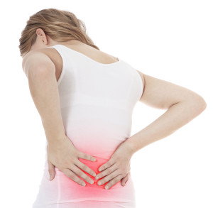 Woman suffering from low back pain