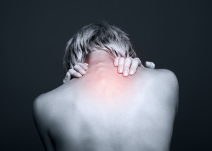 Woman suffering from chronic pain symptoms