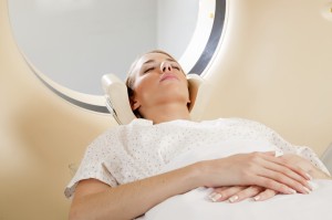 Woman getting CT scan for breast cancer