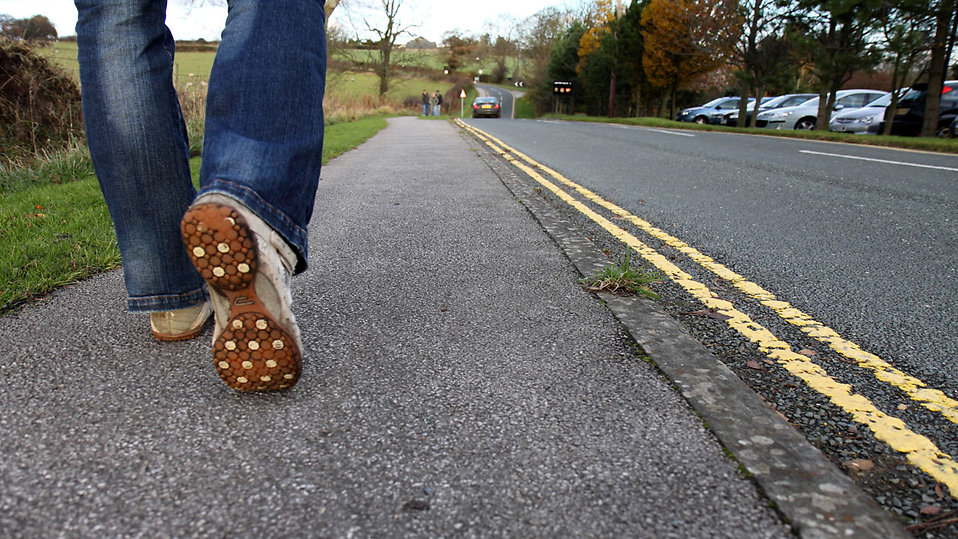 Man with osteoarthritis goes for regular walks