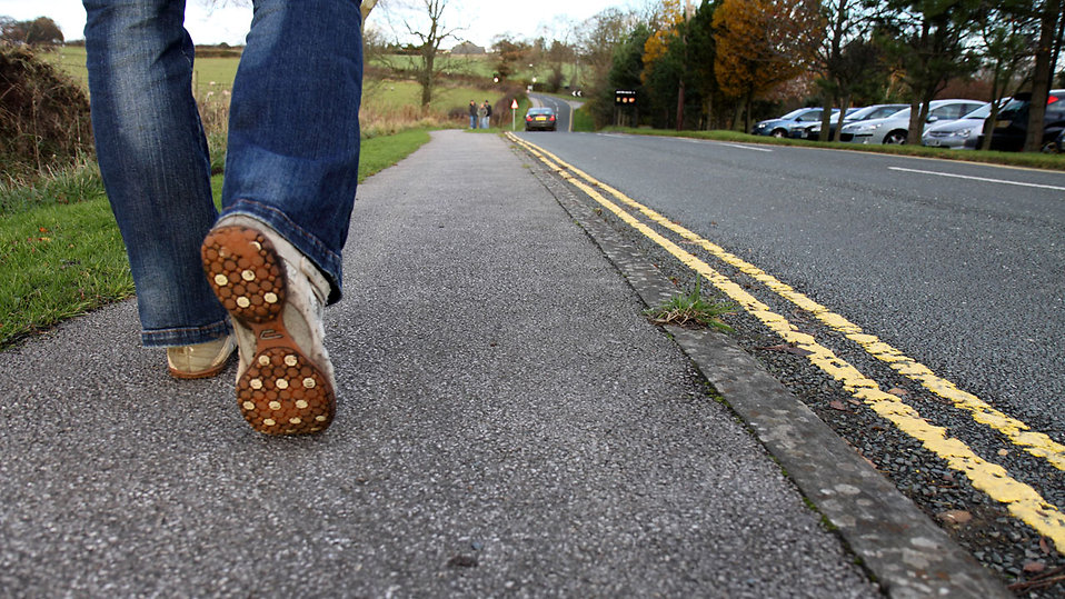 Arthritis sufferer going for his daily walk