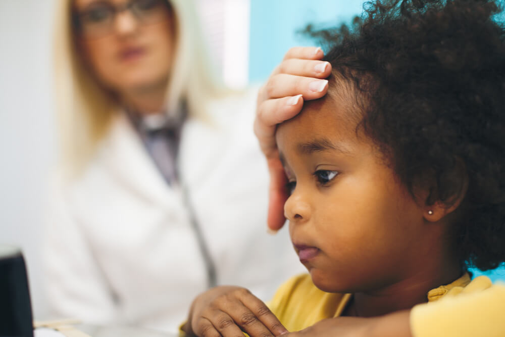 Pediatric cancer patient visits her oncologist