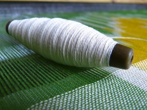 Yarn of silk made from a  silk worm